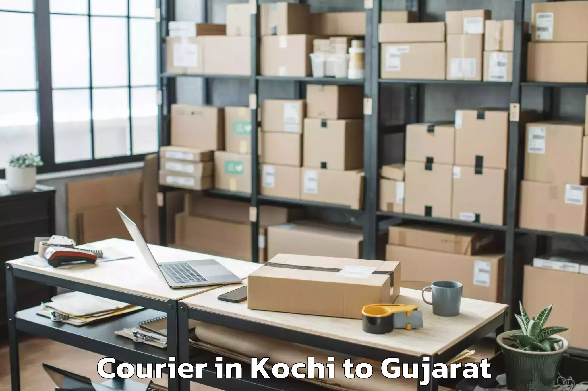 Kochi to Jhulasan Courier